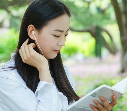 Auriculares con cable y orificio redondo para dispositivos móviles